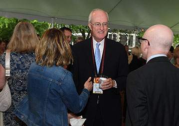 People talking at an event. Links to Gifts of Life Insurance People talking at an event. Links to Gifts of Life Insurance