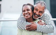 Photo of a married couple smiling. Link to Life Stage Gift Planner Over Age 70 Situations.